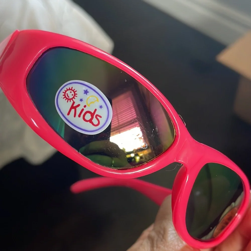 Kids hot pink sunglasses IOP